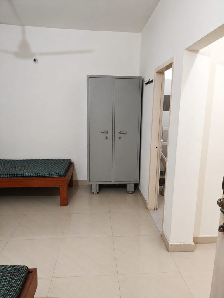 "Non AC PG room with attached washroom & kitchen at Neeldhari House Rajpura"